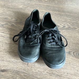 Vans sleek and classic on your deck in the Vans Black Shoes for men or women.